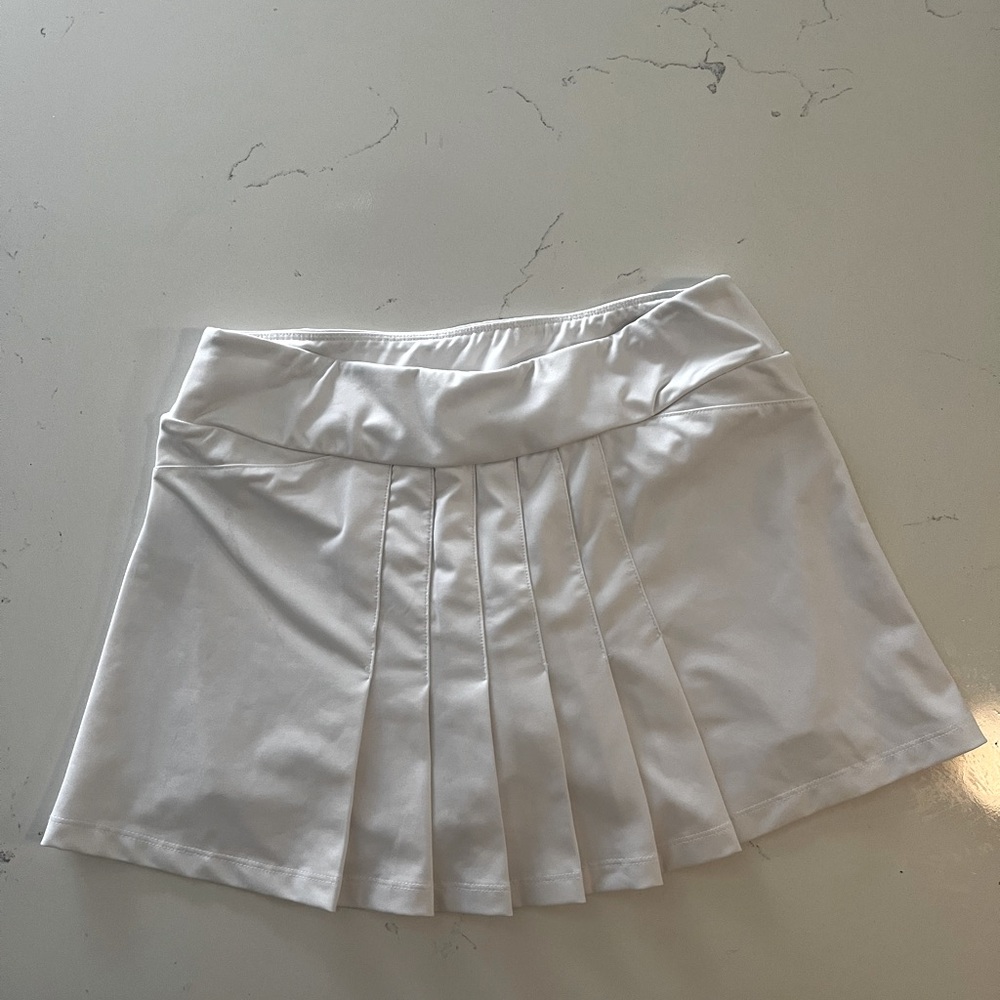 Fila White moisture wicking pleated tennis skirt with built in shorts, Size S.